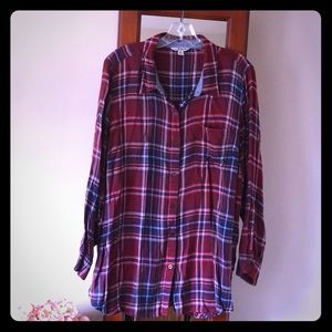 Cute flannel top with fun button flare in back